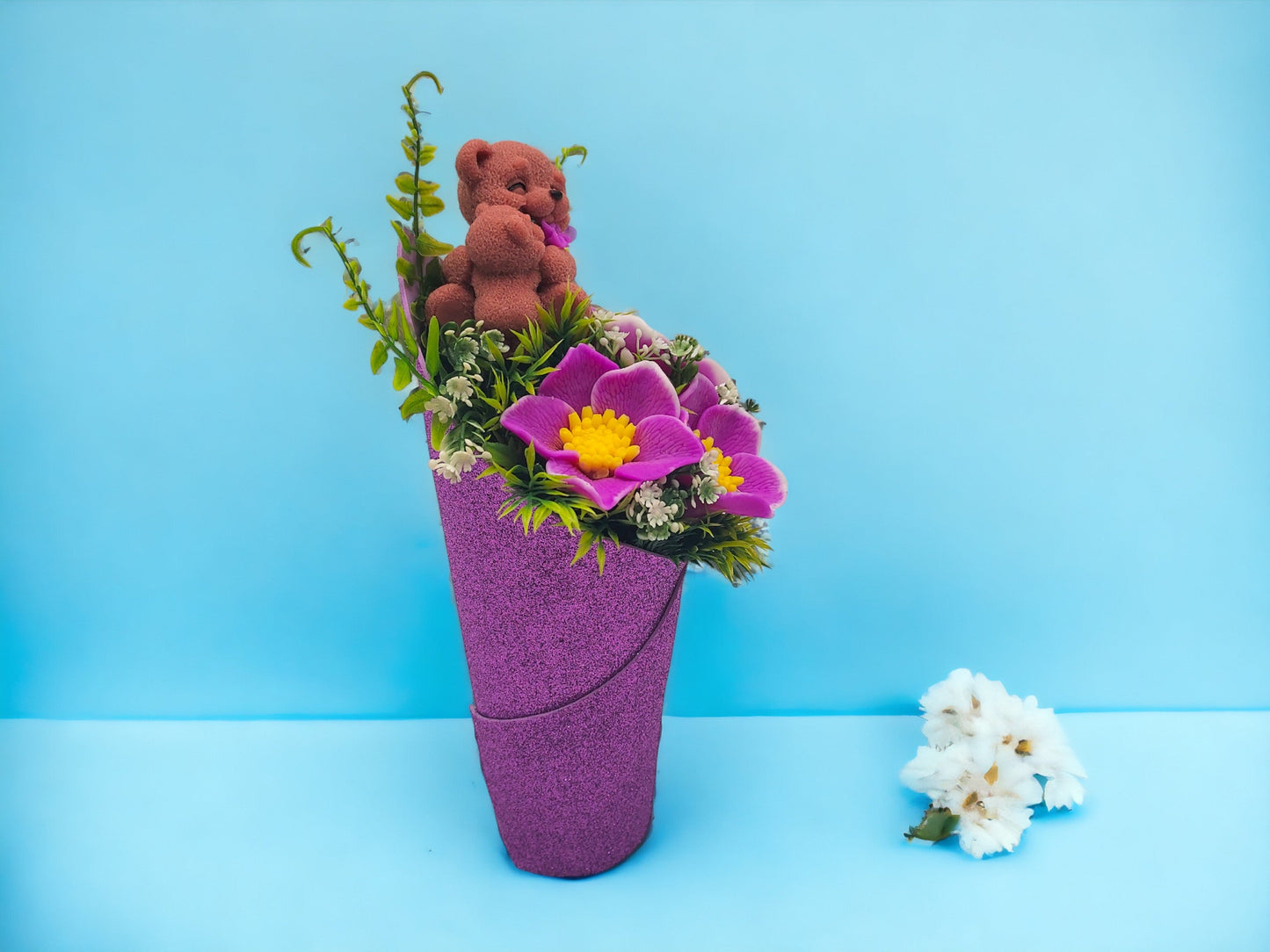 Purple Soap Bouquet Featuring a Bear Mom Embracing her Baby