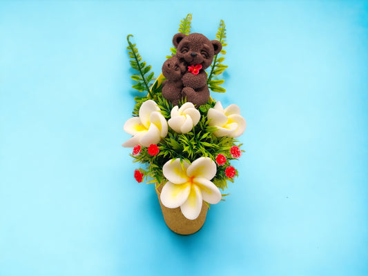 Yellow Soap Bouquet Featuring a Bear Mom Embracing her Baby